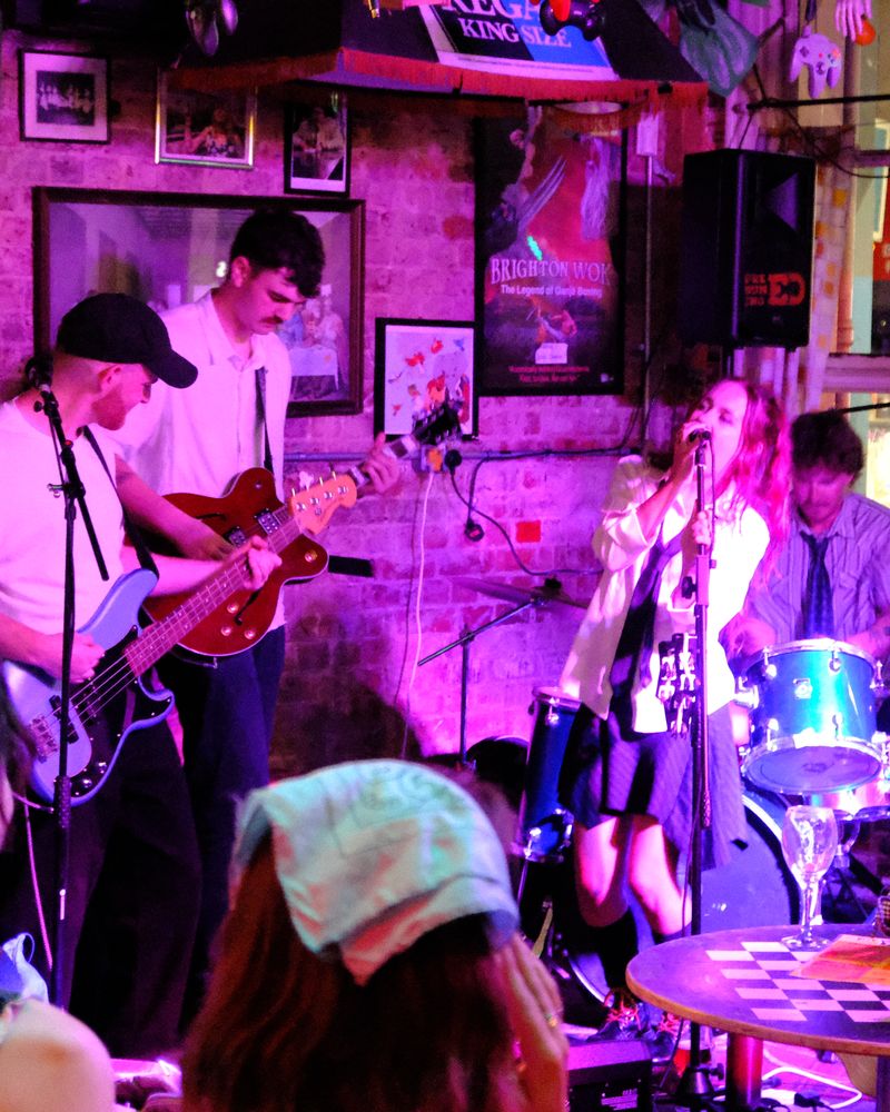 mollywater playing live under pink lights